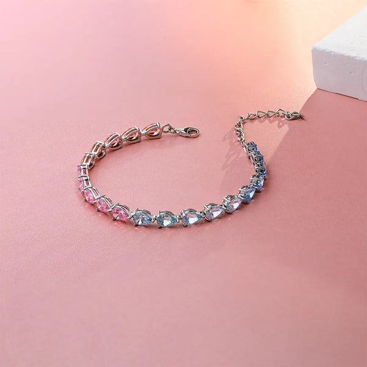 Colorful half pink half blue tennis bracelet with pear shaped gemstones