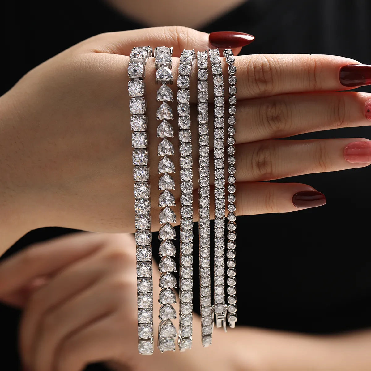 Round Moissanite Minimalist Bracelet in 925 sterling silver with 18K white gold plating, featuring bezel-set 2.5mm moissanites for a sleek, refined look.