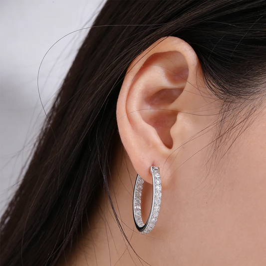 Pavé set 1.75mm moissanite huggie hoop earrings, 925 sterling silver with 18K white gold plating, hypoallergenic 20.5mm design.