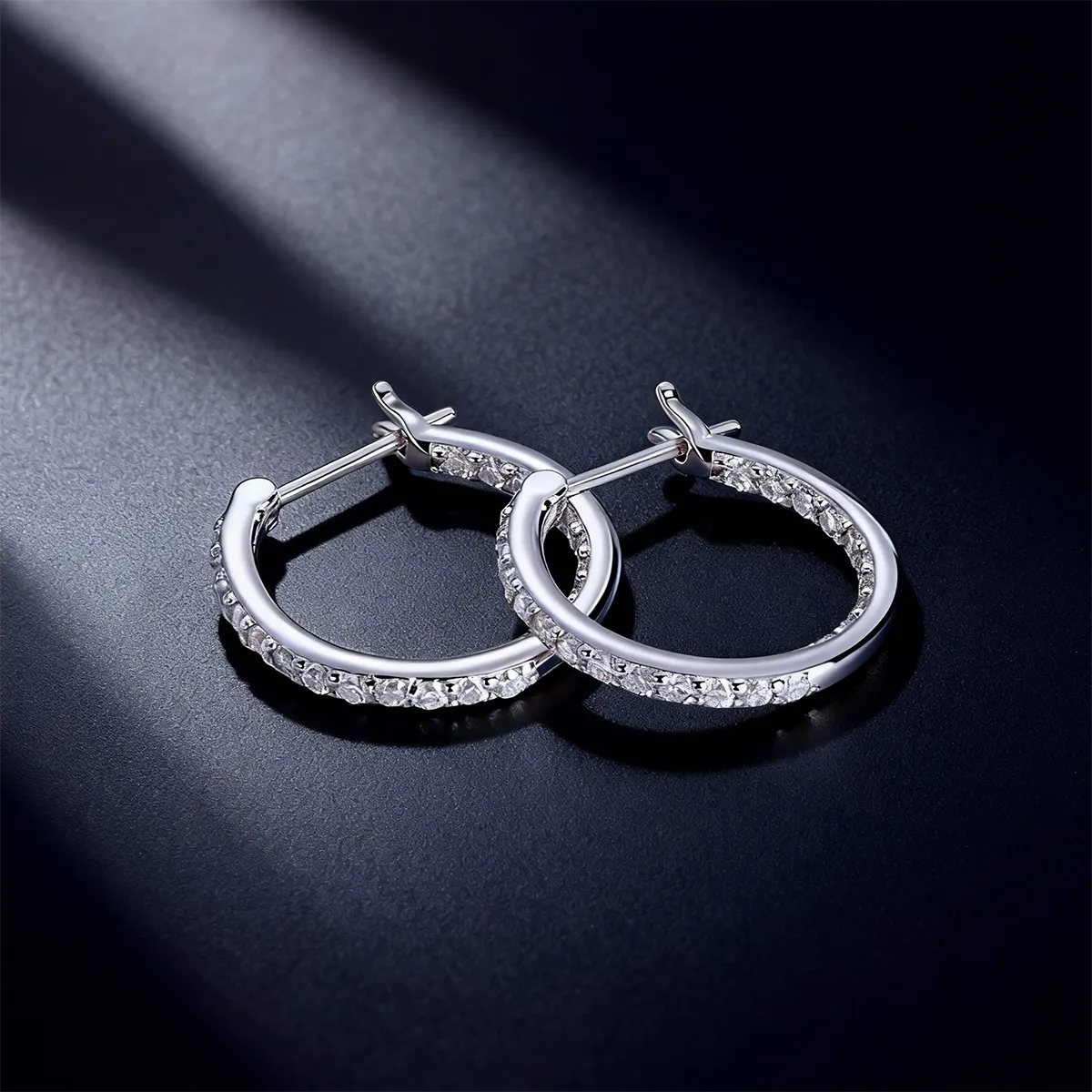 Pavé set 1.75mm moissanite huggie hoop earrings, 925 sterling silver with 18K white gold plating, hypoallergenic 20.5mm design.