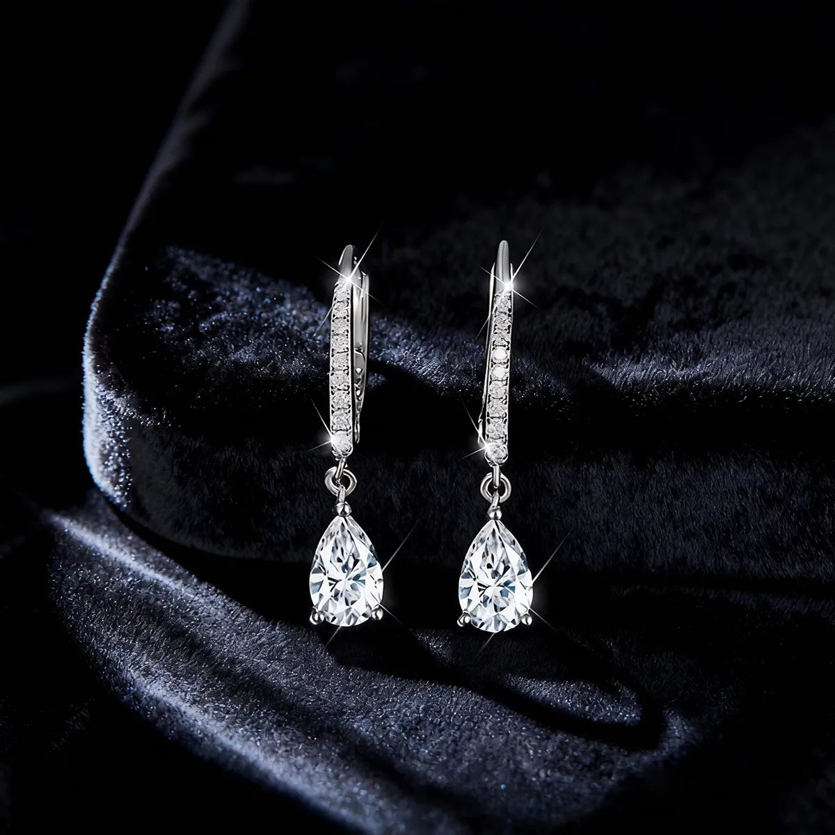 Pavé hoop teardrop drop earrings with 8×5mm pear-cut moissanite stones, 925 sterling silver with 18K white gold plating.