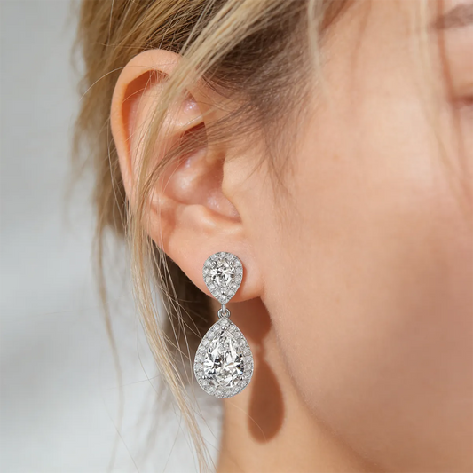Double teardrop halo drop earrings with 9×6mm pear-cut moissanite, 925 sterling silver with 18K white gold plating.