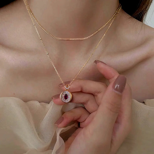 Vintage ruby necklace with oval lab-grown ruby and cubic zirconia in gold-plated sterling silver