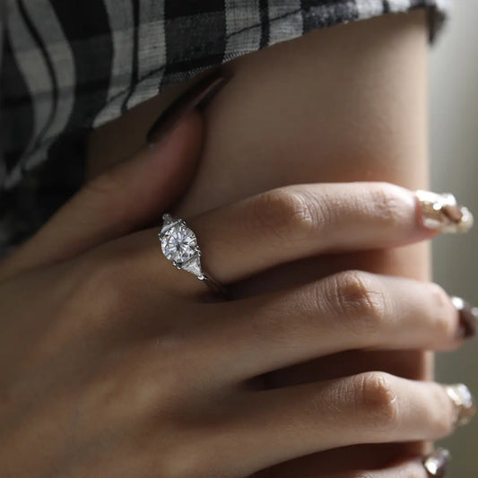 Shera Jewelry 2.6ct Round Cut Moissanite Ring Side View, Trillion Side Stones, 18K White Gold Plated Silver