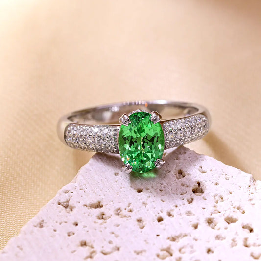 Verdant Grace ring with 8x6mm oval green YAG gemstone and CZ accents in sterling silver