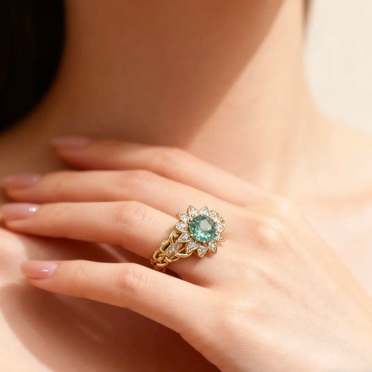 light green lab diamond floral ring with round center stone and marquise side stones