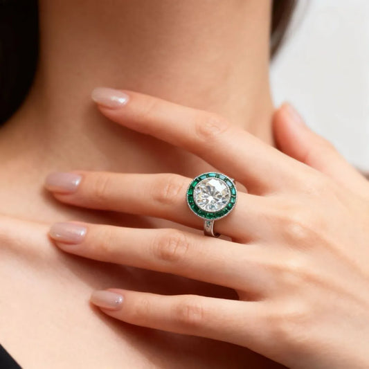 Art Deco–inspired 14K white gold ring with 2.5ct round lab diamond and emerald-cut side stones