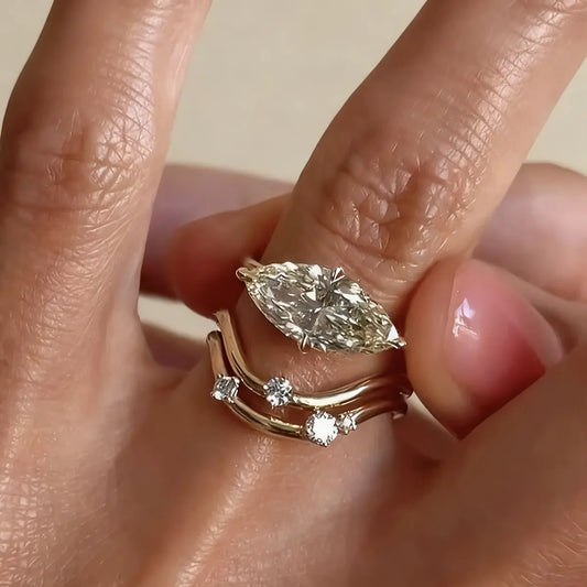 Double-layer wave ring with 2.0ct marquise lab diamond in yellow gold