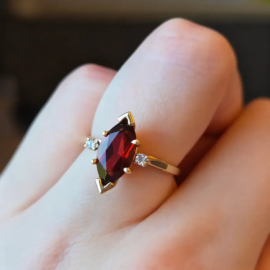 14K yellow gold ring with 1.8ct marquise-cut deep red lab-grown ruby and round cubic zirconia accents