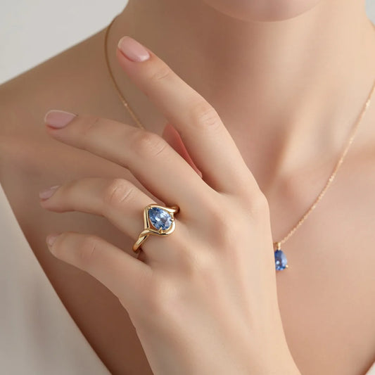 14K gold pear-cut blue lab sapphire ring with slim band