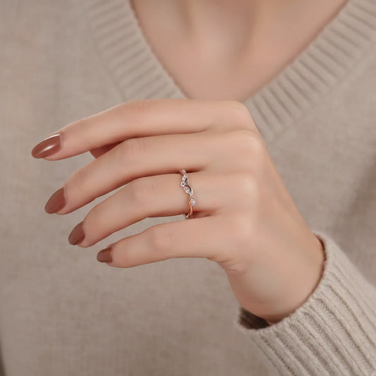 14K rose gold V-shaped stacking ring with delicate lab-grown diamonds, perfect for engagement ring pairing