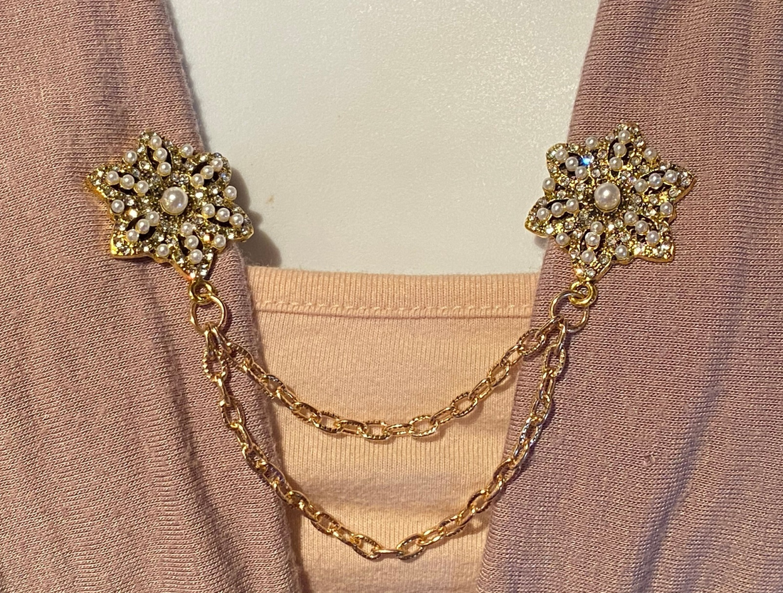 Vintage Jewelry: The History and Charm of Sweater Clips and Sweater Guards