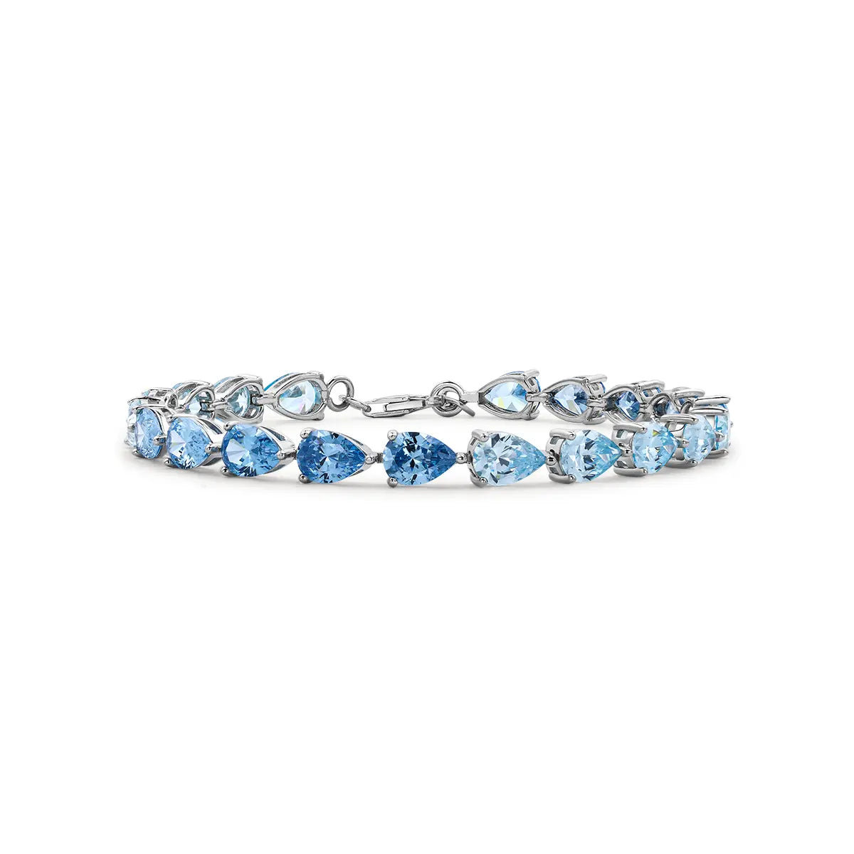 Blue gradient tennis bracelet with pear cut zirconia gemstones in sterling silver