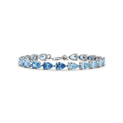 Blue gradient tennis bracelet with pear cut zirconia gemstones in sterling silver