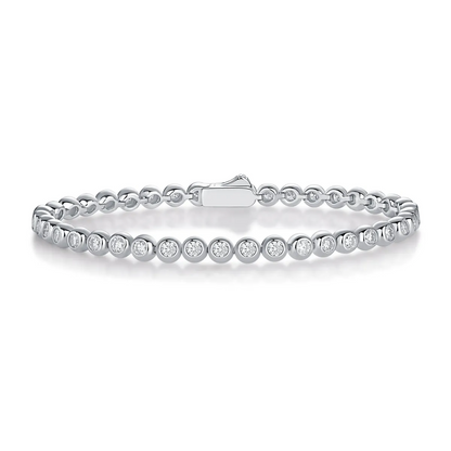 Round Moissanite Minimalist Bracelet in 925 sterling silver with 18K white gold plating, featuring bezel-set 2.5mm moissanites for a sleek, refined look.