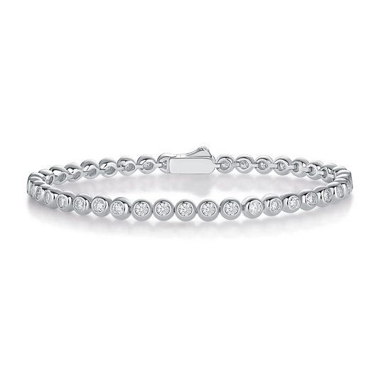 Round Moissanite Minimalist Bracelet in 925 sterling silver with 18K white gold plating, featuring bezel-set 2.5mm moissanites for a sleek, refined look.