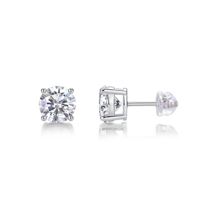 Round cut moissanite stud earrings in four-prong sterling silver setting, 6.5mm hypoallergenic design.