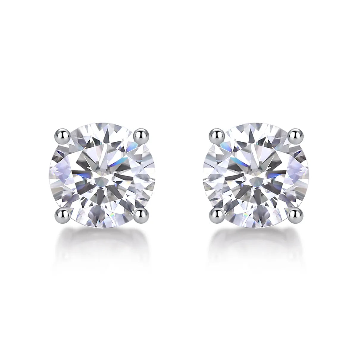 Round cut moissanite stud earrings in four-prong sterling silver setting, 6.5mm hypoallergenic design.
