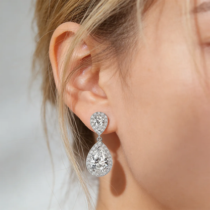 Double teardrop halo drop earrings with 9×6mm pear-cut moissanite, 925 sterling silver with 18K white gold plating.