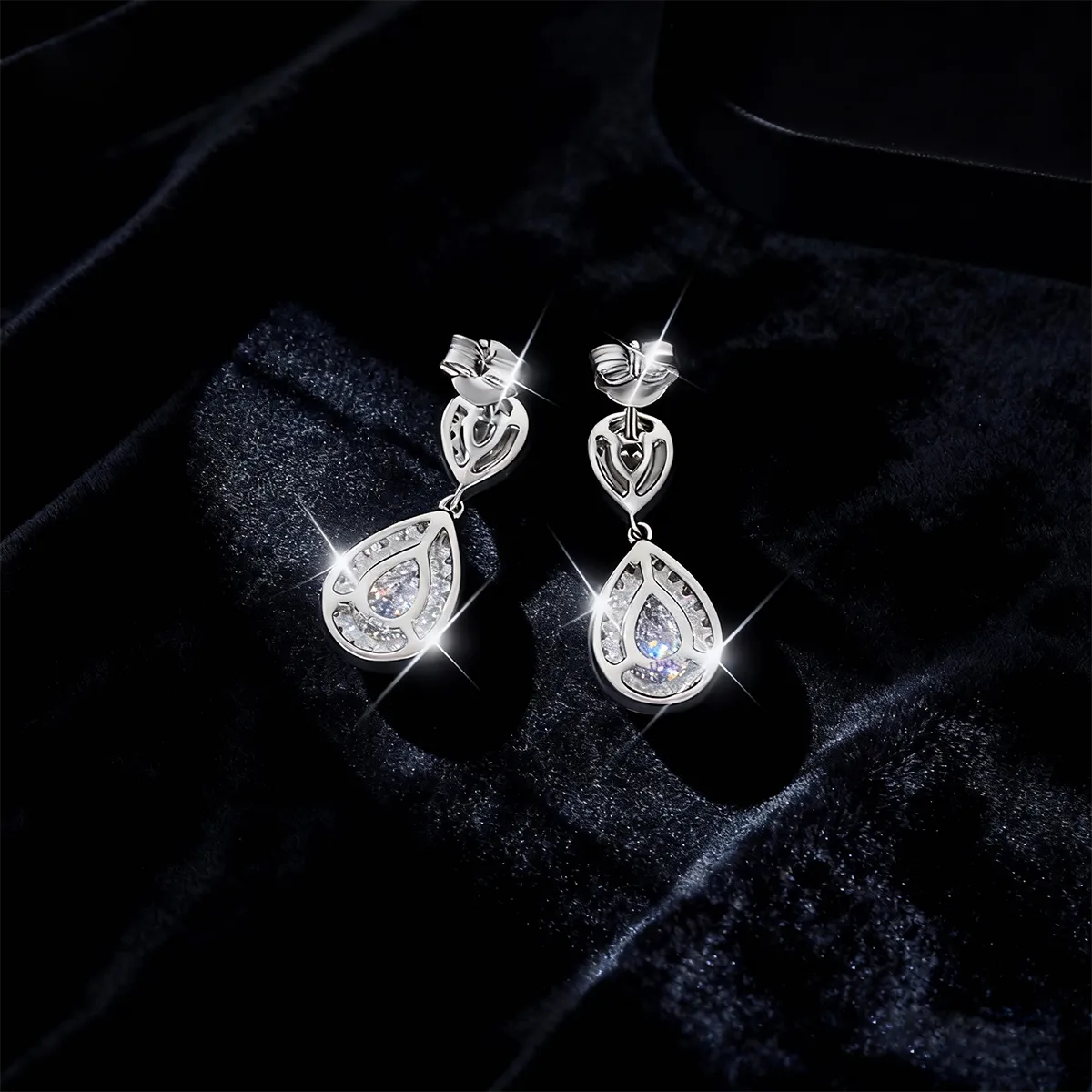 Double teardrop halo drop earrings with 9×6mm pear-cut moissanite, 925 sterling silver with 18K white gold plating.
