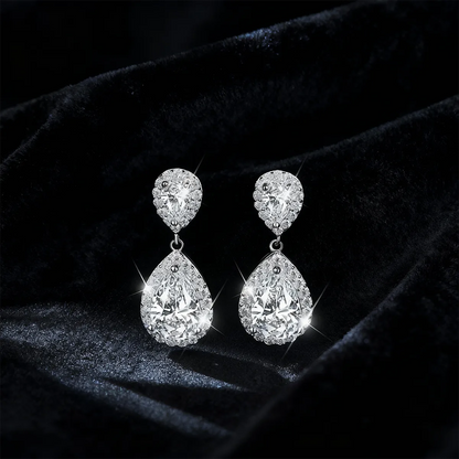 Double teardrop halo drop earrings with 9×6mm pear-cut moissanite, 925 sterling silver with 18K white gold plating.