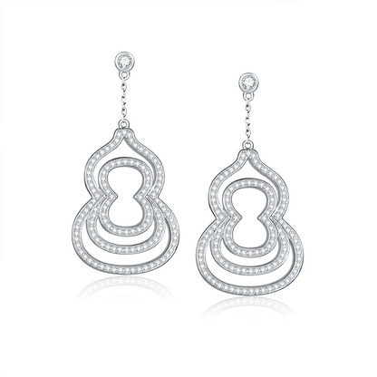 Layered sterling silver gourd drop earrings with airy openwork structure and pavé sparkle, symbolizing luck and abundance.