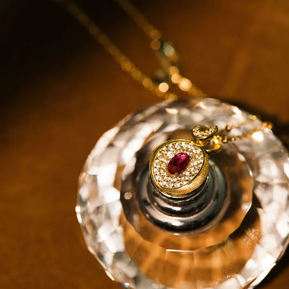 Vintage ruby necklace with oval lab-grown ruby and cubic zirconia in gold-plated sterling silver
