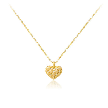 Elegant ruby double-heart necklace with brushed gold disc and starlit bead chain