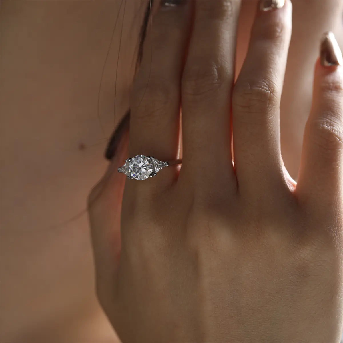 Shera Jewelry 2.6ct Round Cut Moissanite Ring Side View, Trillion Side Stones, 18K White Gold Plated Silver