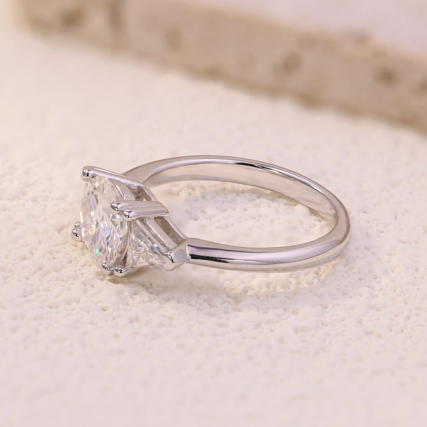 Shera Jewelry 2.6ct Round Cut Moissanite Ring Side View, Trillion Side Stones, 18K White Gold Plated Silver