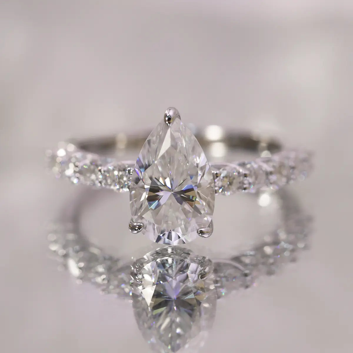 3ct Pear Cut Moissanite Engagement Ring in Sterling Silver with Side Stones