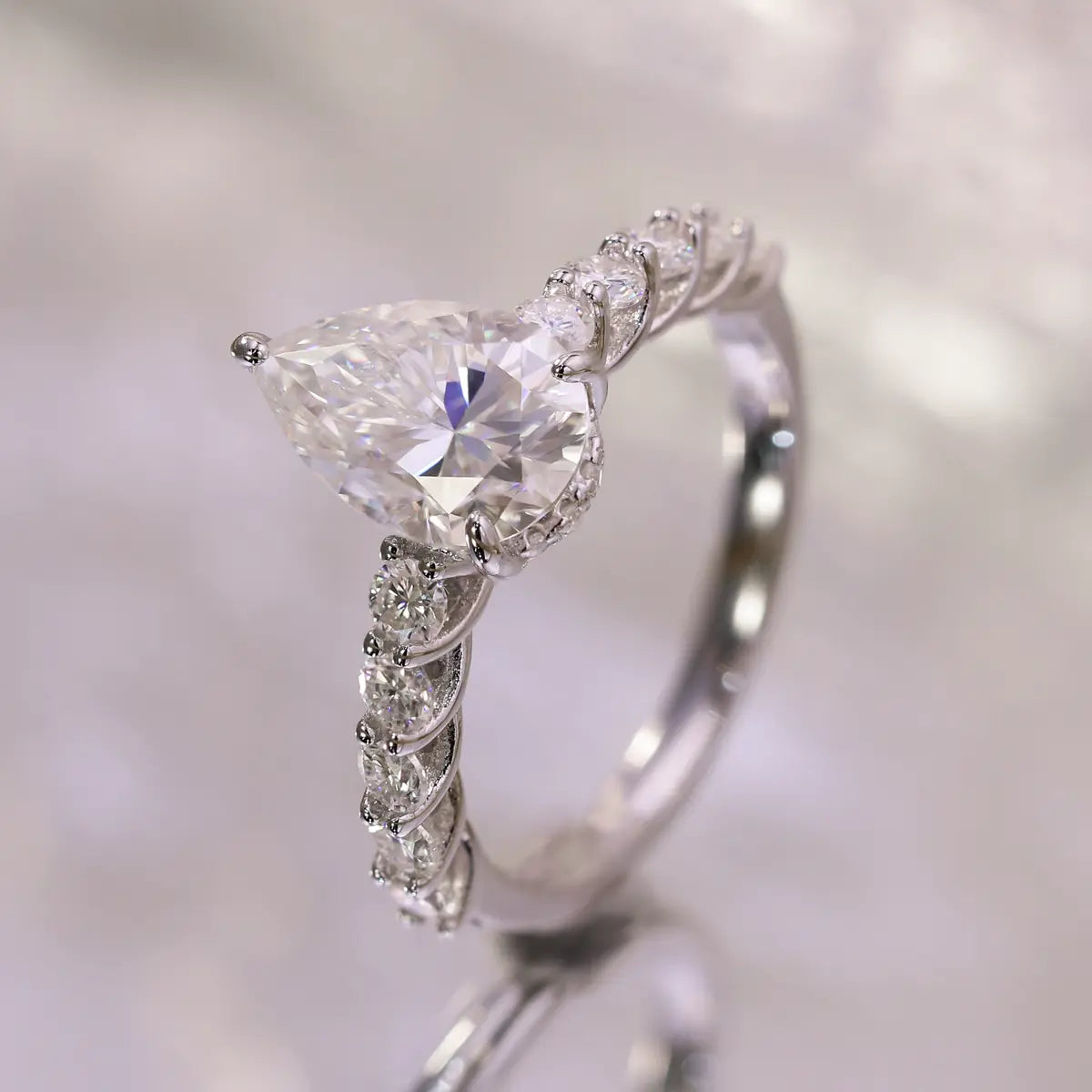 3ct Pear Cut Moissanite Engagement Ring in Sterling Silver with Side Stones