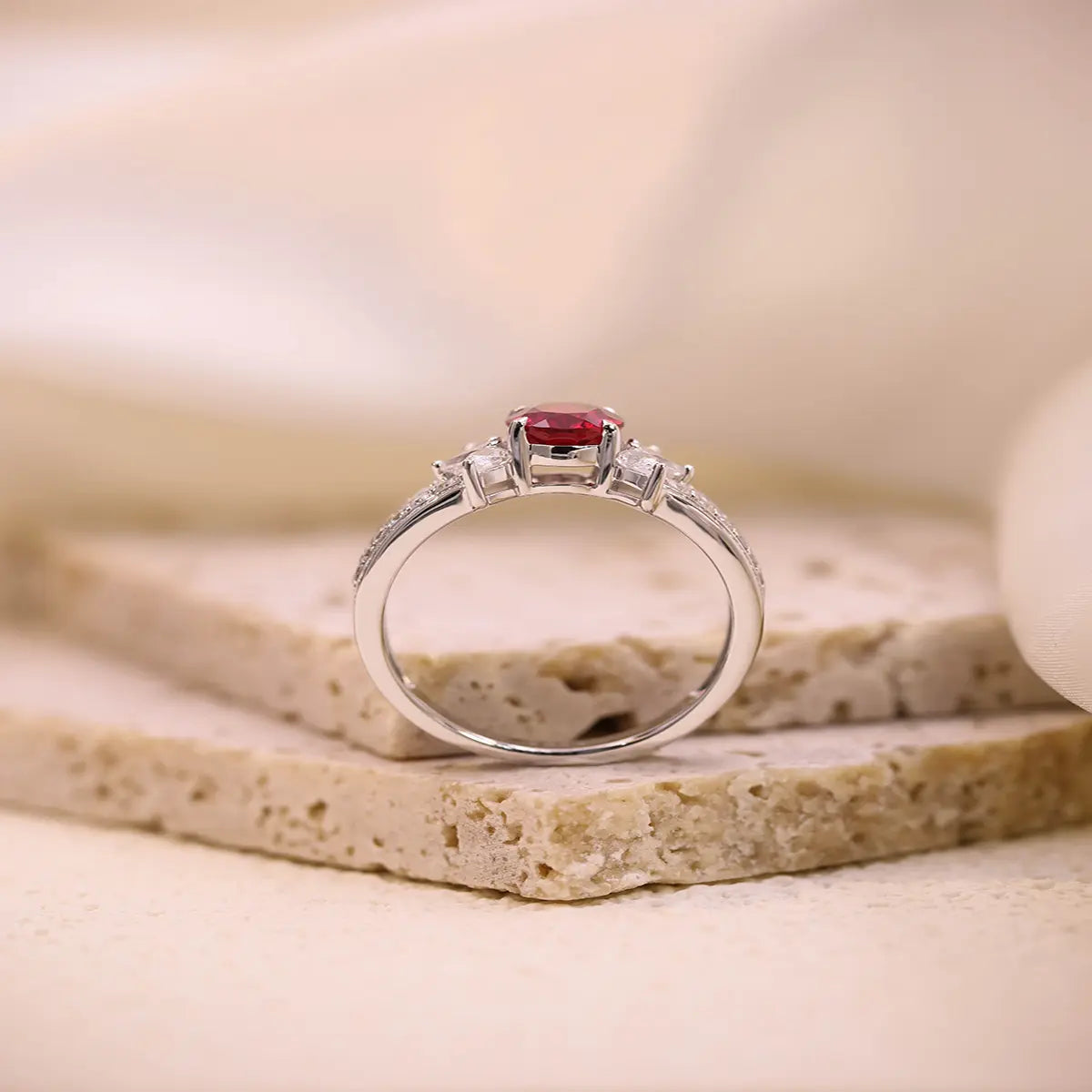 Romantic ruby promise ring with marquise CZ side stones, vintage design