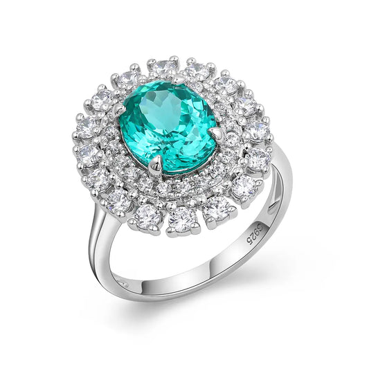 Emerald Whisper ring with 10x8mm oval Portuguese cut YAG Paraiba stone and cubic zirconia accents in sterling silver