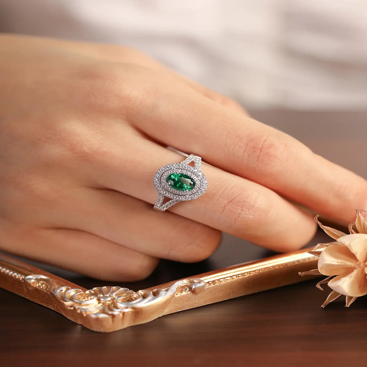 Sterling silver split shank ring with 1.35ct green YAG center stone and white CZ details