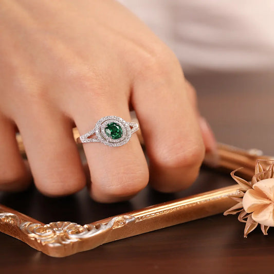 Sterling silver split shank ring with 1.35ct green YAG center stone and white CZ details