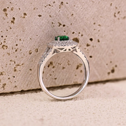 Sterling silver split shank ring with 1.35ct green YAG center stone and white CZ details