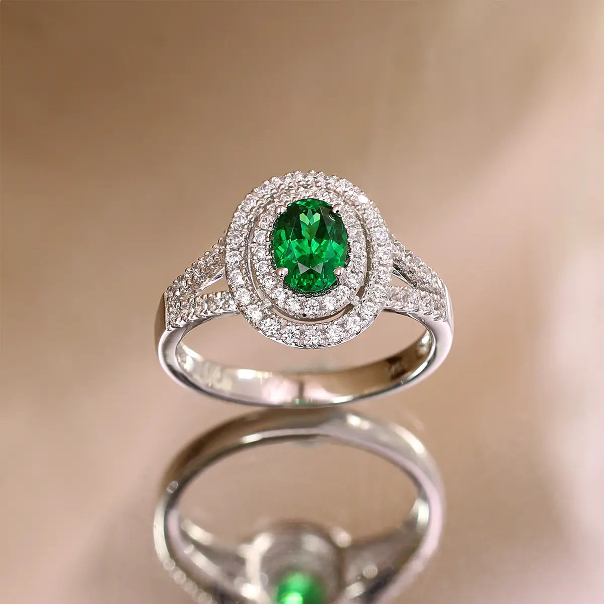 Sterling silver split shank ring with 1.35ct green YAG center stone and white CZ details