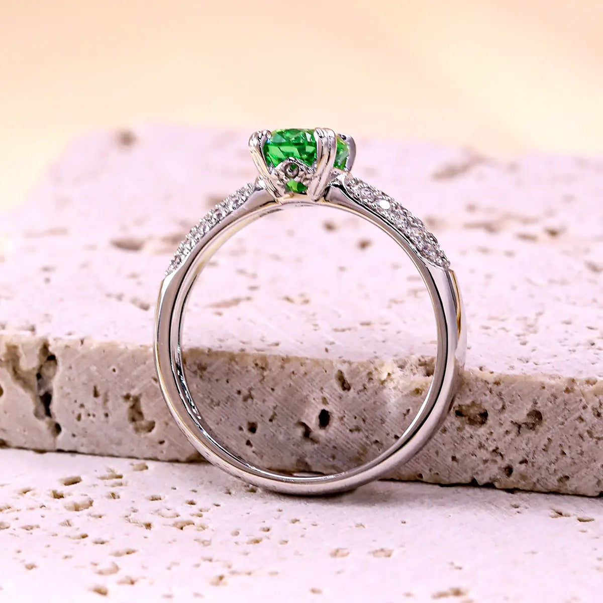 Verdant Grace ring with 8x6mm oval green YAG gemstone and CZ accents in sterling silver