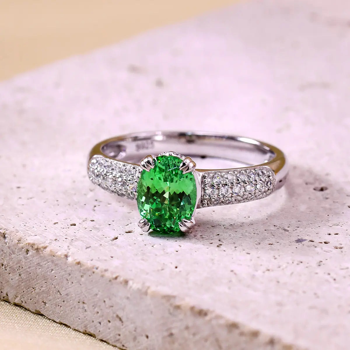 Verdant Grace ring with 8x6mm oval green YAG gemstone and CZ accents in sterling silver