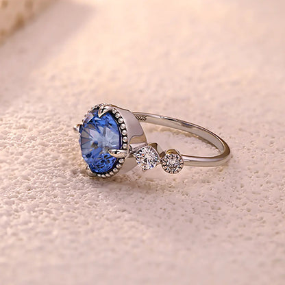 Snowveil Blue Ring with 3.9ct round cornflower sapphire in sterling silver