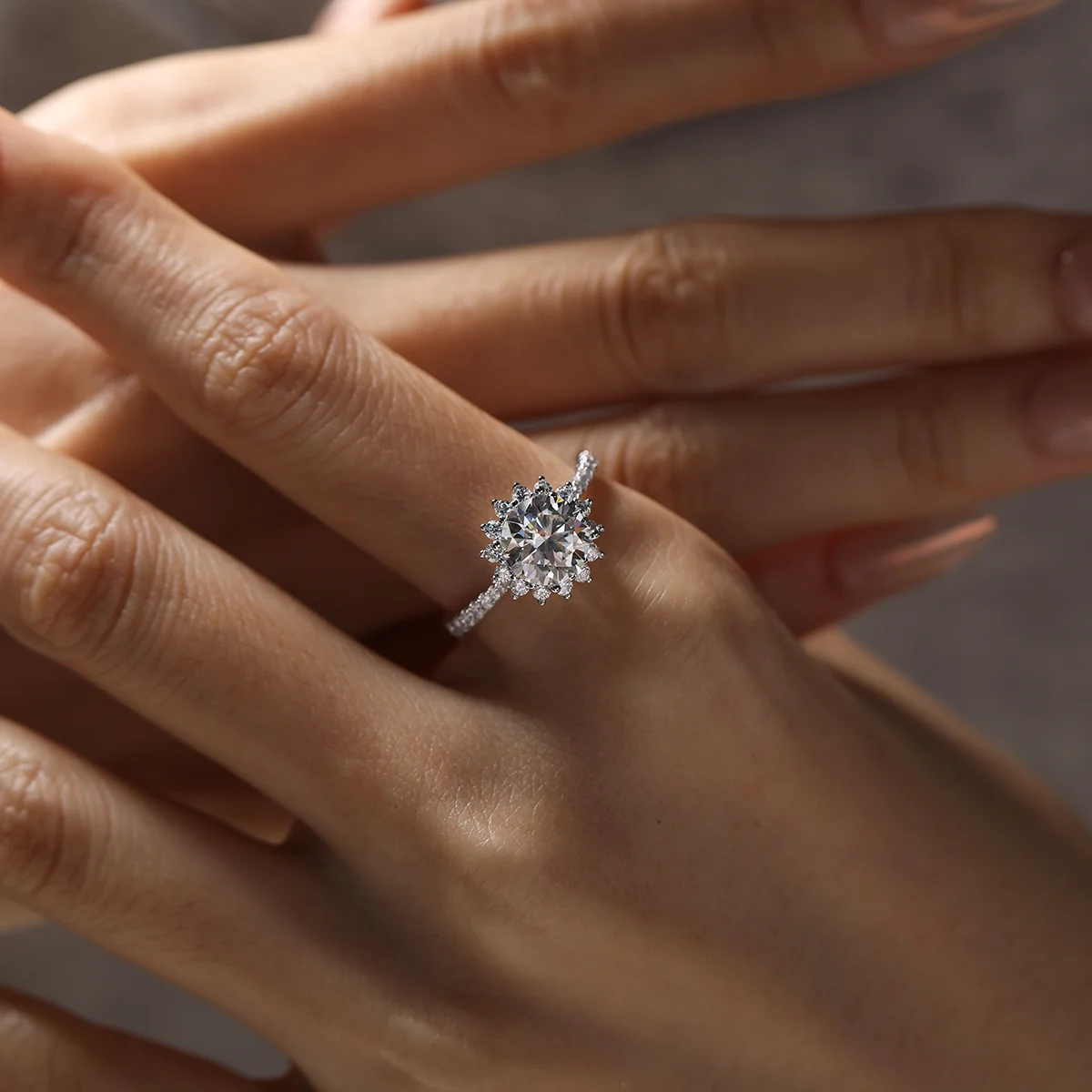 Sunflower-inspired engagement ring featuring 2ct moissanite and delicate silver band