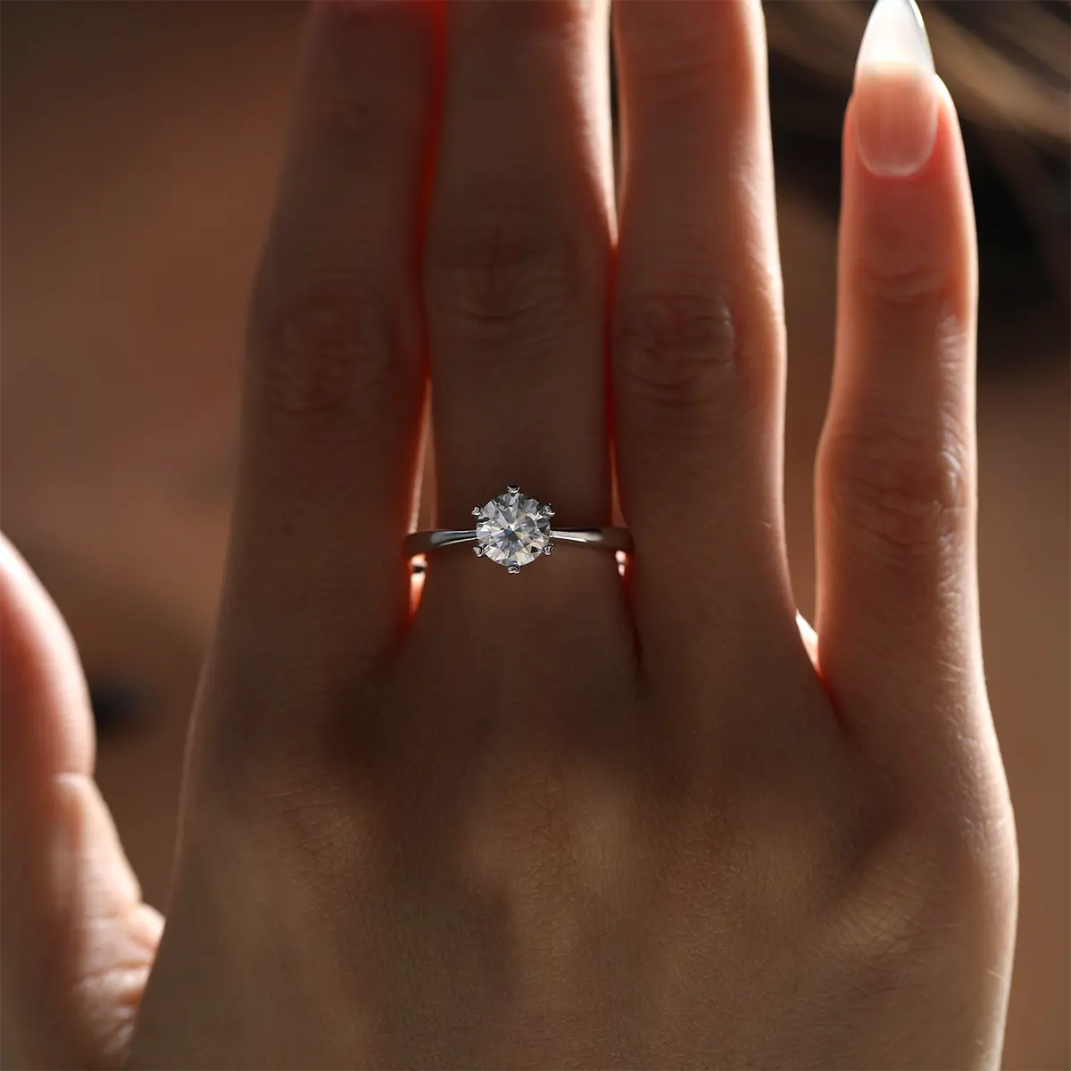 1ct round moissanite six-prong engagement ring in 925 silver with 18K white gold plating, heart-shaped prongs