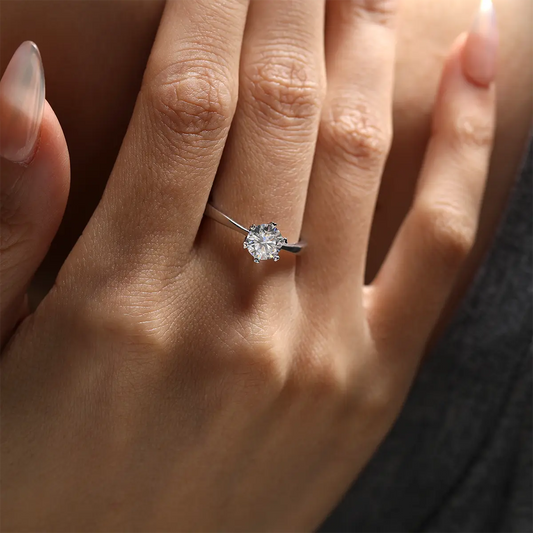 1ct round moissanite six-prong engagement ring in 925 silver with 18K white gold plating, heart-shaped prongs