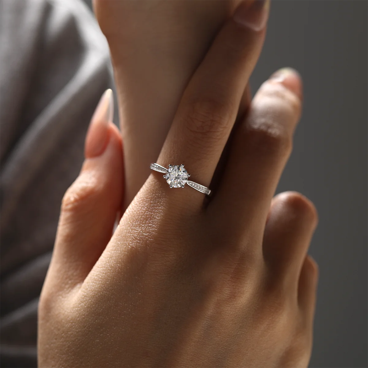 1ct Round Moissanite Heart-Prong Pave Ring in 925 Sterling Silver with 18K White Gold Plating, featuring heart-shaped six prongs and sparkling pave band.