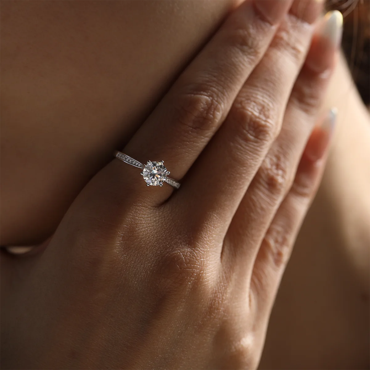 1ct Round Moissanite Heart-Prong Pave Ring in 925 Sterling Silver with 18K White Gold Plating, featuring heart-shaped six prongs and sparkling pave band.