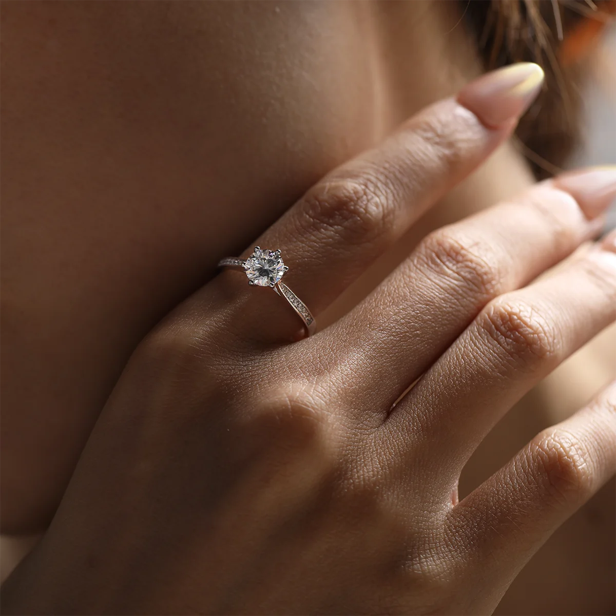 1ct Round Moissanite Heart-Prong Pave Ring in 925 Sterling Silver with 18K White Gold Plating, featuring heart-shaped six prongs and sparkling pave band.