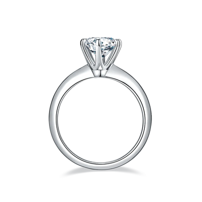 1.5ct round moissanite ring with classic six-prong setting in 925 sterling silver and 18K white gold plating, elegant and timeless design