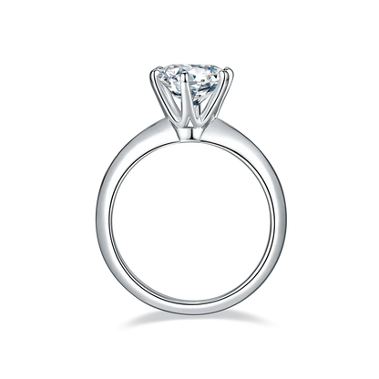 2ct round moissanite ring with classic six-prong setting in 925 sterling silver and 18K white gold plating, elegant and timeless engagement style