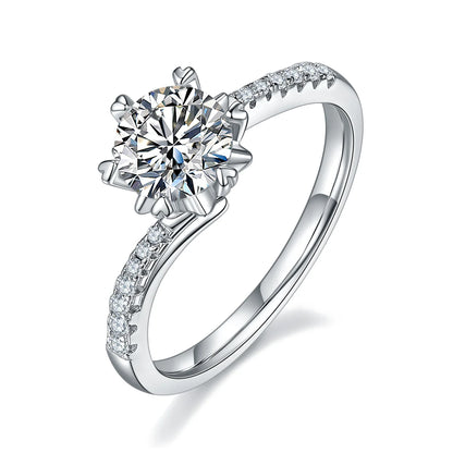 Round moissanite six-prong twisted band ring in silver, 1 carat center stone.